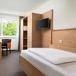 Отель Stadthotel Am Roemerturm